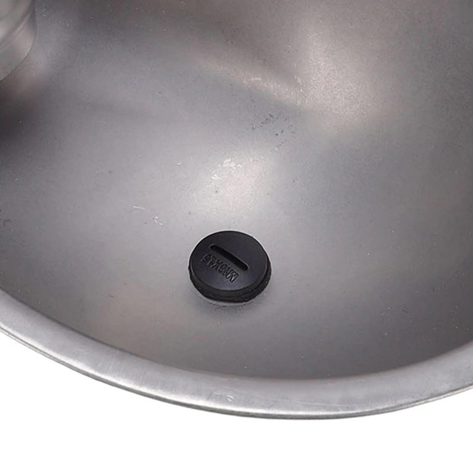 Close-up of drain plug inside empty Manewise stable waterer bowl