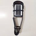 Manewise GPS tracker solar panel fitted into black strap harness